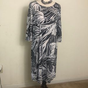 Black and white lose fitting dress.